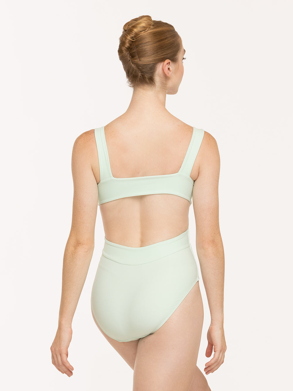 Eleve Dancewear Jackie Leotard Kids in Spearmint print color, back view of dancer posing
