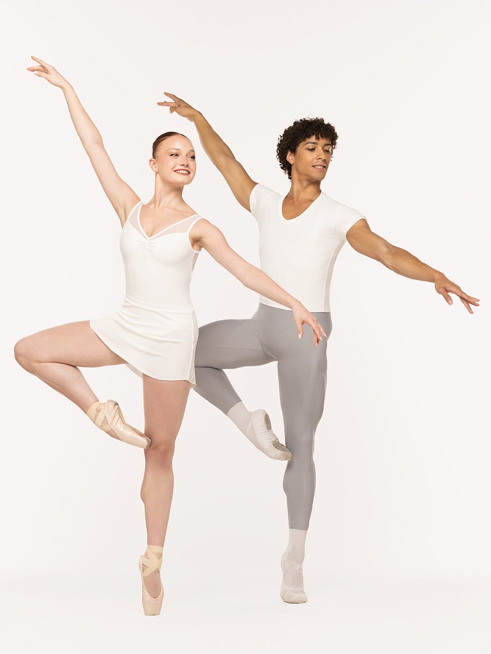 Eleve Dancewear John Shirt Kids in Stage White color, front view of two dancers on pique passe epaulement