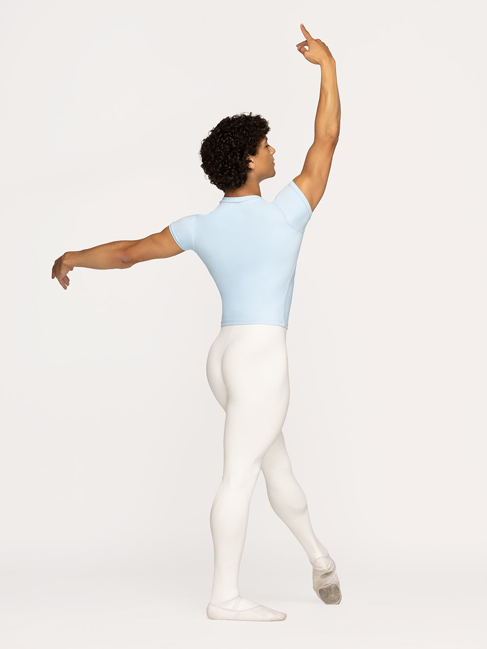 Eleve Dancewear Ryan Tights Kids in Stage White color, back view of dancer on tendu devant croise