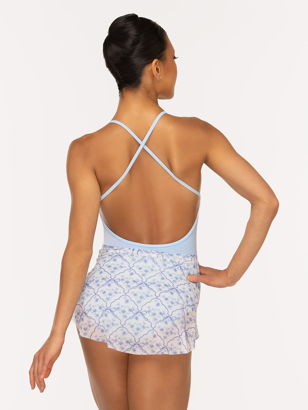 Eleve Dancewear Calla Skirt in Final Bow Mesh print, back view of dancer posing