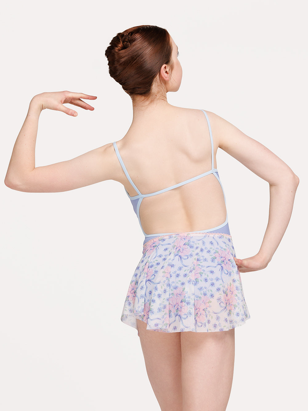 Eleve Dancewear Open Shoulder Crop Top in Encore Mesh print, detail back view of dancer posing