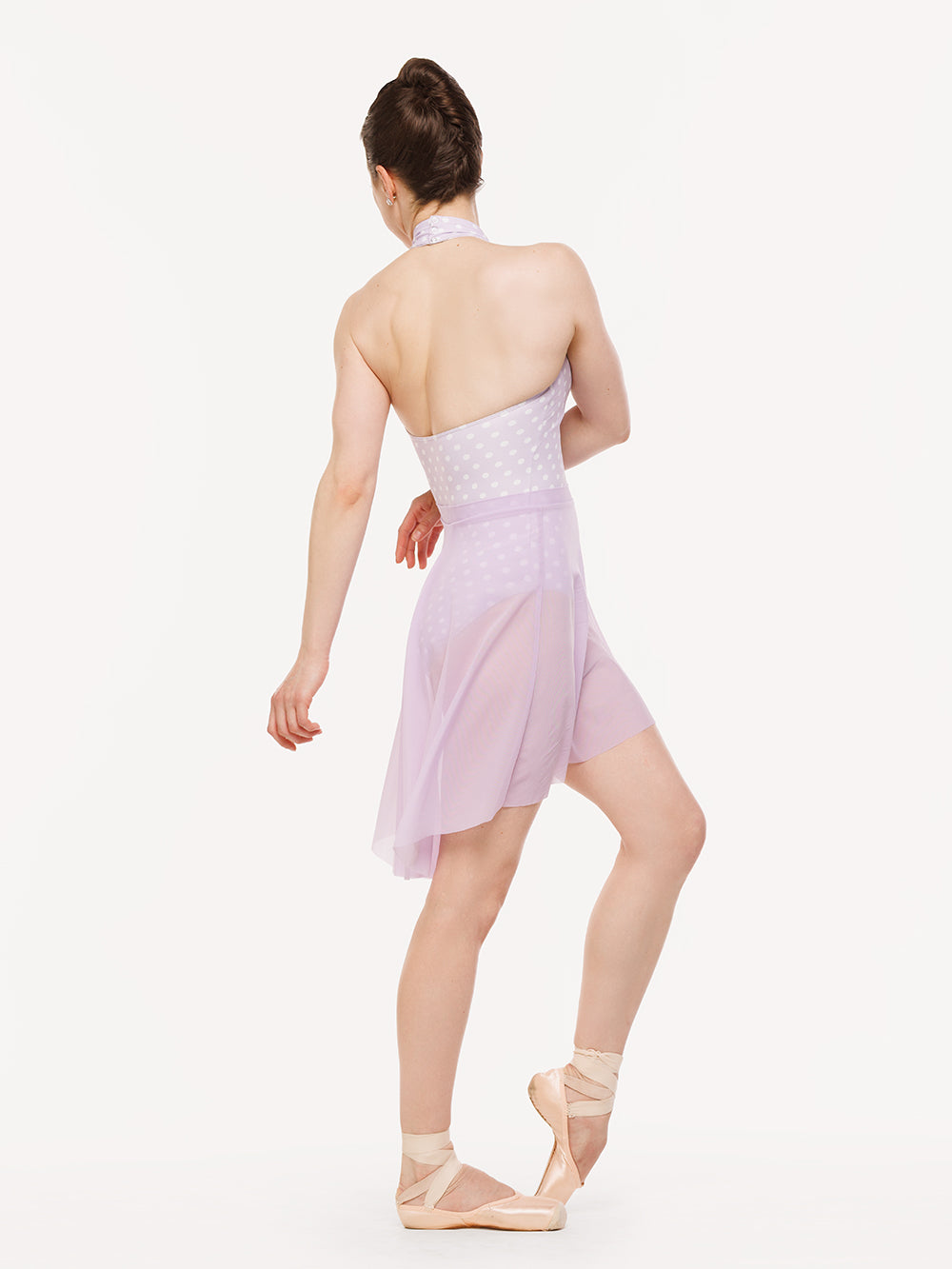 Eleve Dancewear Flare Skirt Kids in Whisper Polka Dot print color, back view detail of dancer posing