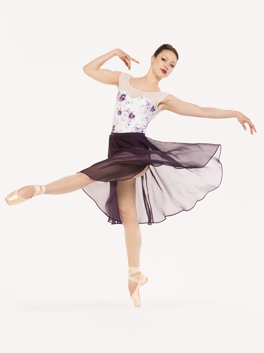 Eleve Dancewear Chiffon Rehearsal Skirt in Eggplant color, front view of dancer on pique front eleve croise