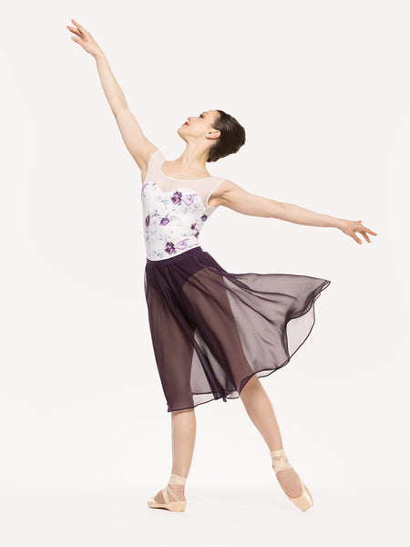 Eleve Dancewear Chiffon Rehearsal Skirt in Eggplant color, front view of dancer on tendu derriere efface
