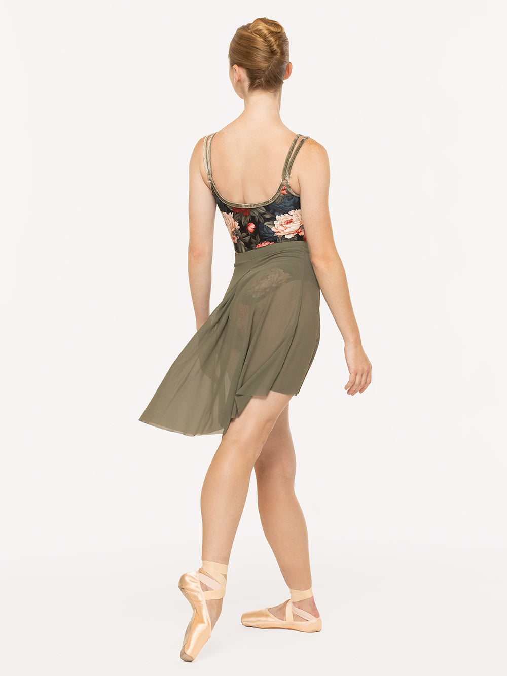 Eleve Dancewear Farrah Leotard Kids in Winter Florals print, back view of dancer on tendu derrriere
