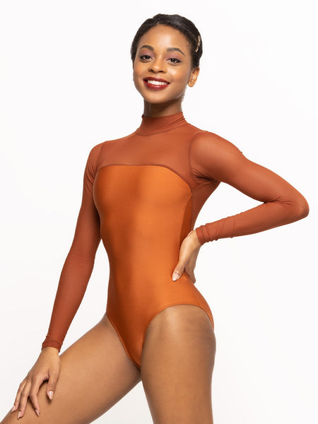 Model is wearing a shiny Copper orange leotard with Picante orange mesh sleeves and high neck