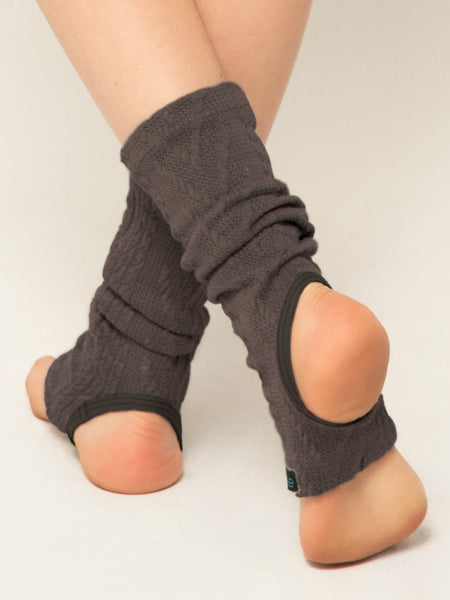 Modal is in ankle light knitted leg warmers in charcoal 