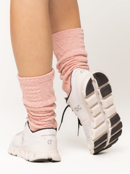 Back of stirrup leg warmers in ankle cable knit rose