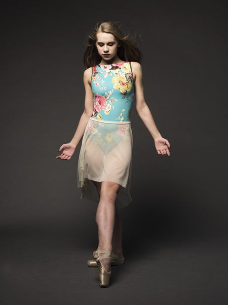 Model showcasing Ivory mesh skirt 