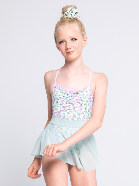 Close up of Model in leotard in candy print and sea glass mesh skirt