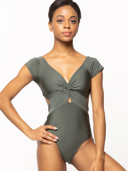 Model is in pinched front metallic leotard 