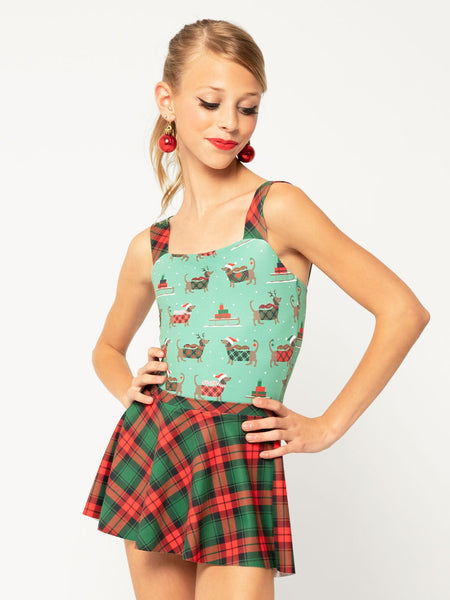Model is in holiday Dachshund pattern leotard with holiday plaid skirt 