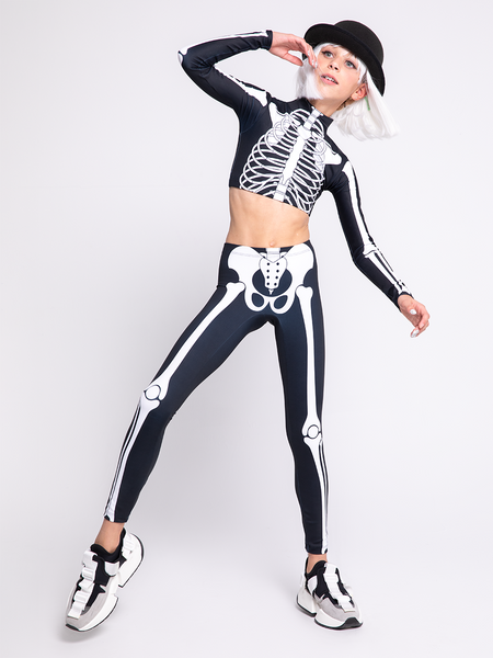 full body shot of model in X-ray skeleton Crop top with matching tights  looking off camera 